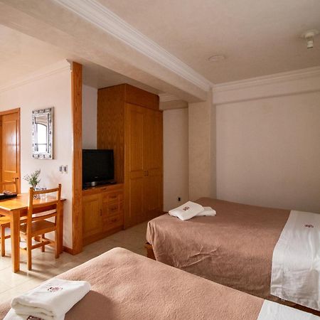 Suites Sevilla Puebla Eksteriør bilde